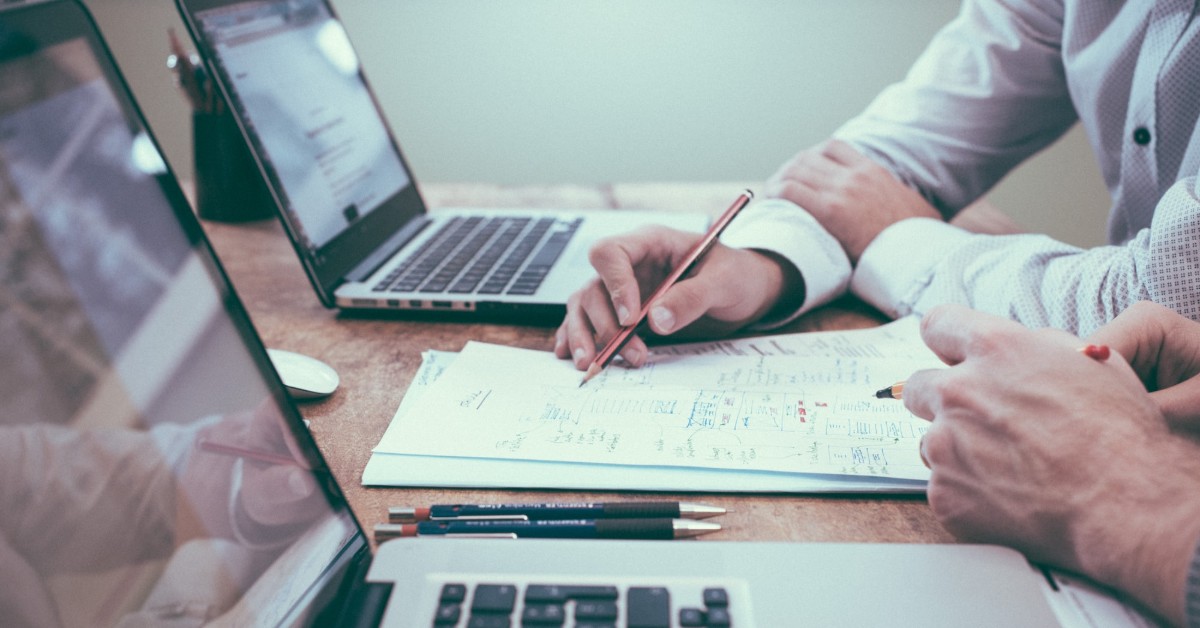 people on laptops working