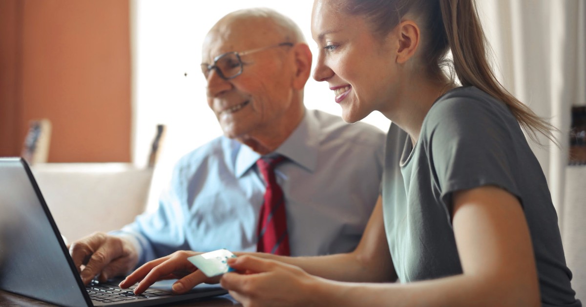 man and woman on computer