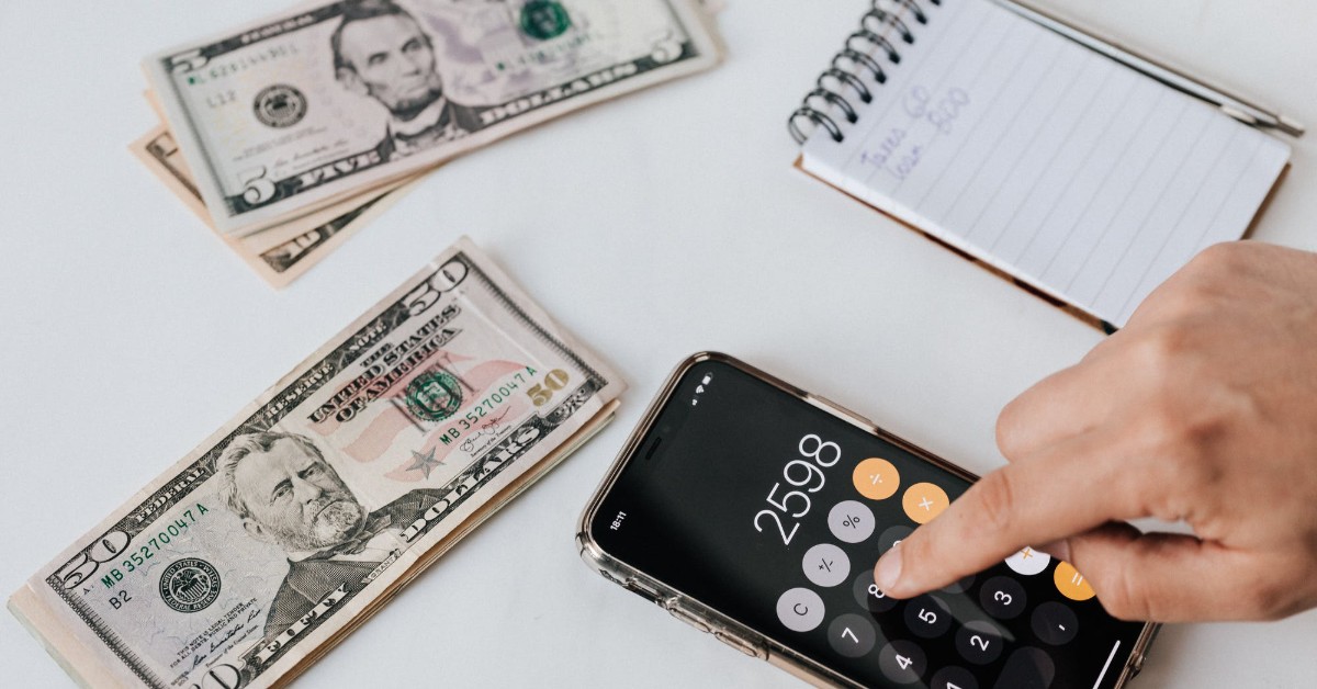 money and calculator and paper