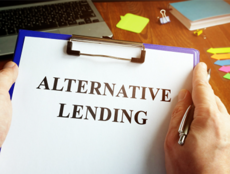 A clipboard with a piece of paper on it that says ALTERNATIVE LENDING in all capital letters. This implies that this article is about alternative direct payday loans.
