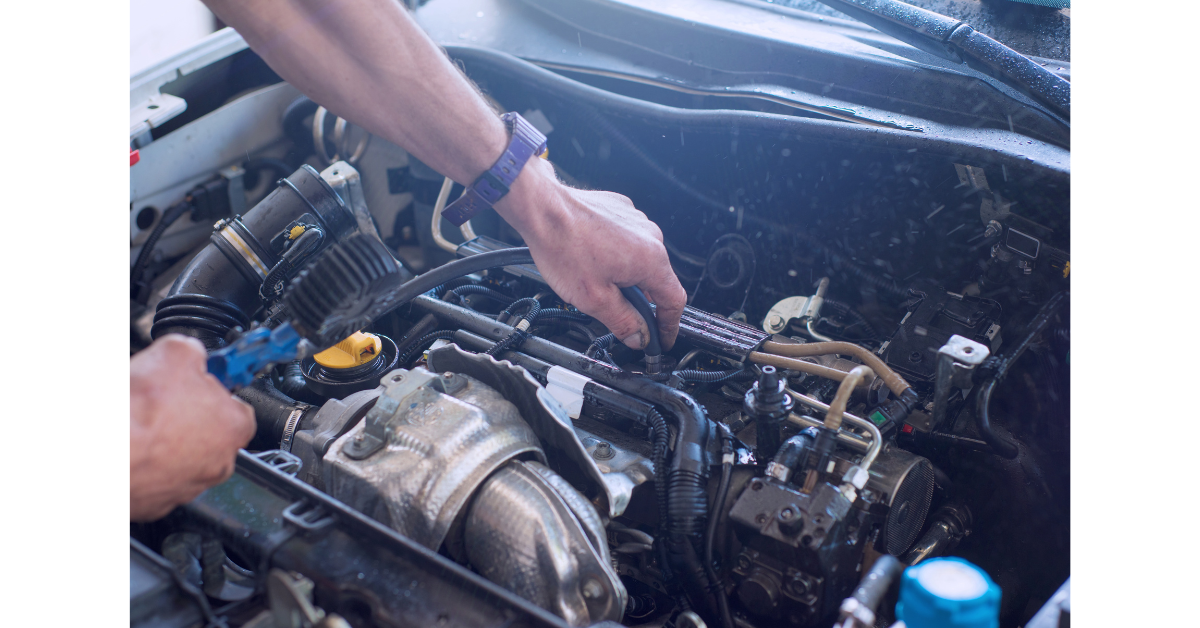 Car being repaired by mechanic